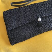 Pochette dentelle noire à motifs